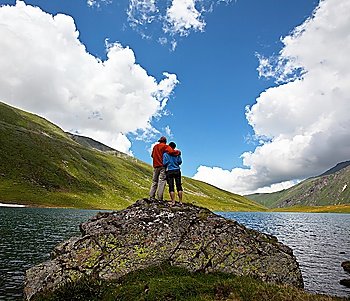 Couple on mountains lake