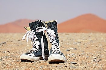Jeans shoe in desert