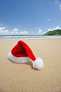 Santa´s hat on a tropical beach
