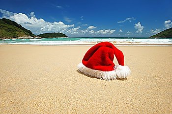 Santa´s hat on a tropical beach