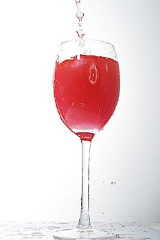 pouring liquid into  wineglass