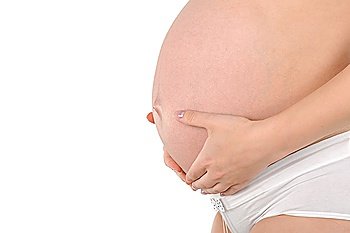 young beautiful pregnant woman with hands on her belly