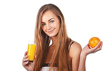 beautiful young blond  woman with orange and glass of juice  in her hands