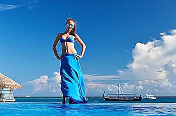 Woman in skirt at the pool