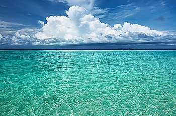 Crystal clear turquoise water at tropical maldivian beach