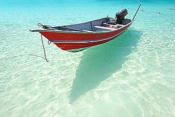 Beautiful beach with motor boat at Perhentian islands, Malaysia