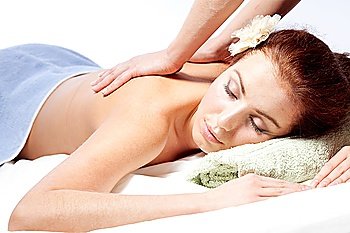 Young woman enjoyng a massage