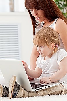 Loving family looking at a laptop