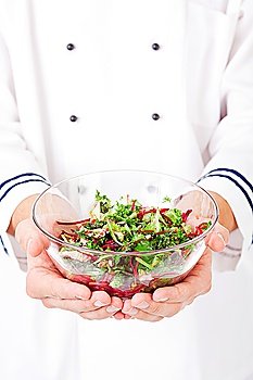 Hands with salad