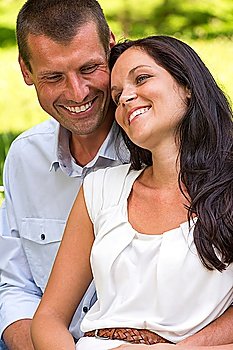 Close up portrait of young happy couple outdoors