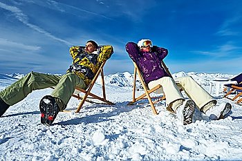 Couple at mountains in winter, Meribel, Alps, France