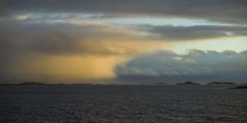 Scenic view of sea against cloudy sky, Nordland, Norway