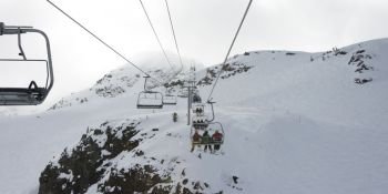 Ski lifts over snow covered mountain, Whistler, British Columbia, Canada
