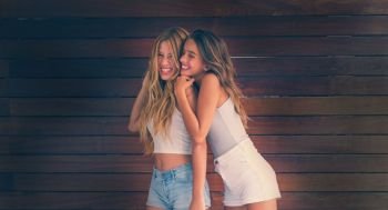 Best friends teen girls happy having fun together filtered image