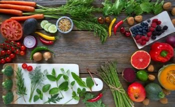 Healthy food vegetables for heart heath on wooden background. Healthy food vegatebles for heart heath on wood