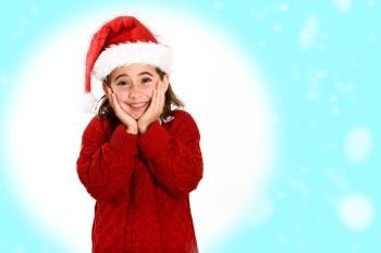 Adorable little girl wearing santa hat isolated on fantasy background. Winter clothes for Christmas