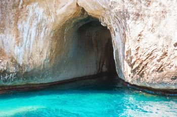 Big sea cave in the mediterranean coast. Sardinia, Italy.. Big sea cave in the mediterranean coast