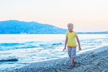Kid boy walking. Kid boy walking at Alania beach, Turkey