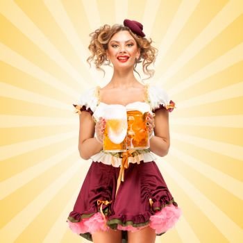 Beautiful sexy Oktoberfest waitress, wearing a traditional Bavarian dress dirndl, serving two big beer mugs in a tavern and smiling on colorful abstract cartoon style background.