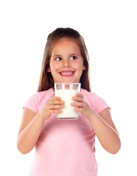 Adorable child drinking milk isolated on a white background