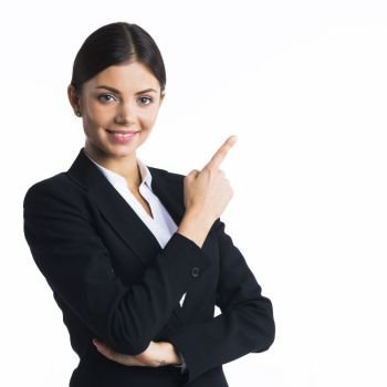 Business woman pointing at copyspace. Business woman pointing at copyspace, isolated on white background