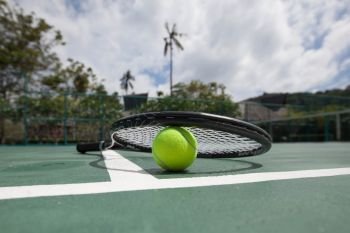 Tennis Ball with Racket. Tennis Ball with Racket on tennis court close up