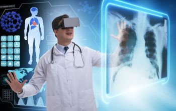 Doctor examining x-ray images using virtual reality glasses