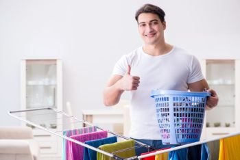Man doing laundry at home