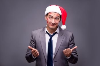 Man wearing santa in funny festive concept