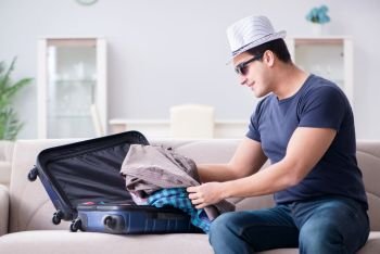 Man with hat preparing for summer vacation
