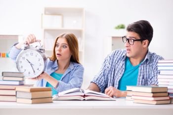Two students runnng out of time to prepare for exams