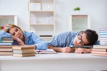 Pair of students studying for university exams