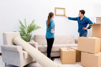 Young family relocating to new house apartment