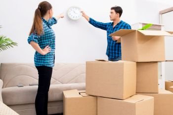 Young family relocating to new house apartment