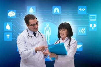 Two doctors discussing issues in telemedicine concept