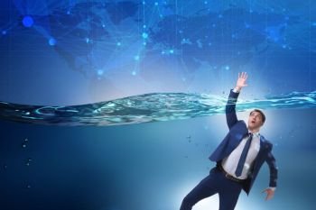 The drowning businessman in insolvency and bankruptcy concept. Drowning businessman in insolvency and bankruptcy concept. The drowning businessman in insolvency and bankruptcy concept