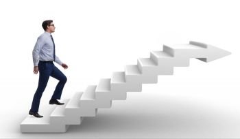The businessman climbing career ladder in business concept. Businessman climbing career ladder in business concept. The businessman climbing career ladder in business concept