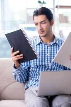 Caucasian student with laptop preparing for university exams. Caucasian student with laptop preparing for university exams 