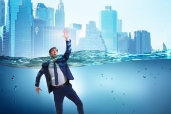 The drowning businessman in insolvency and bankruptcy concept. Drowning businessman in insolvency and bankruptcy concept. The drowning businessman in insolvency and bankruptcy concept