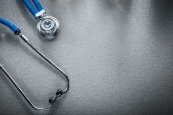 Medical stethoscope on grey background copy space medicine concept.