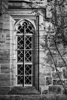Black and white detail image of Regency period design window in medieval house