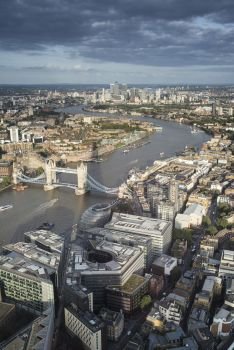 Places. Aerial landscape view of London cityscape skyline with iconic landmark buildings in The City with dramatic sky