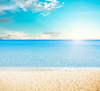 Sun over tropical beach. Sun over tropical beach. Summer vacations day landscape. Sun over tropical beach