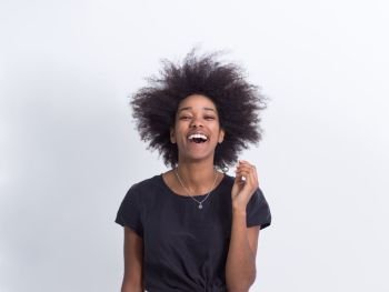 portrait of a beautiful friendly African American woman with a curly afro hairstyle and lovely smile isolated on a white background