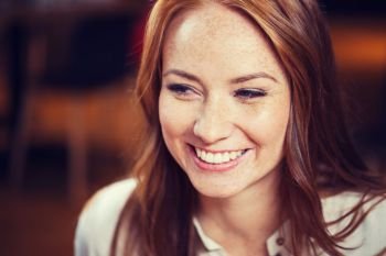 female, gender, portrait and people concept - smiling happy young redhead woman face. smiling happy young redhead woman face