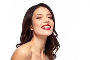 beauty, make up and people concept - happy smiling young woman with red lipstick over white background. beautiful smiling young woman with red lipstick