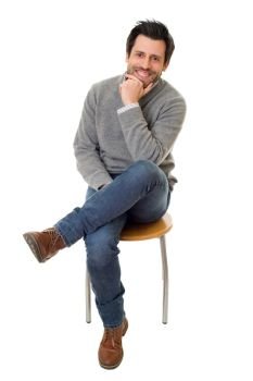happy casual man on a chair, isolated on white background