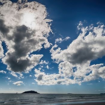 in  australia   beach and the clouds in the sky with sunlight