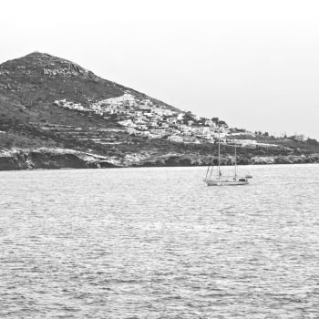 sailing in europe greece santorini island hill  and rocks on the summertime beach 