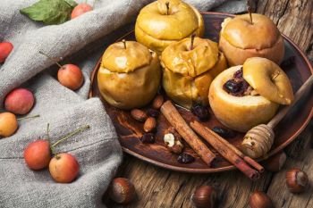 autumn apples baked. baked apples stuffed with nuts and berries
